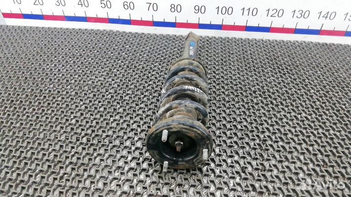 Стойка амортизатора переднего правого Mitsubishi M