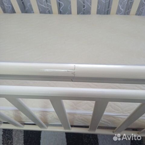 Детская кроватка с продольным маятником