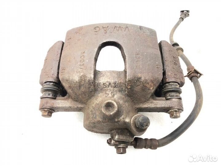 Суппорт тормозной передний правый Skoda Fabia 5J