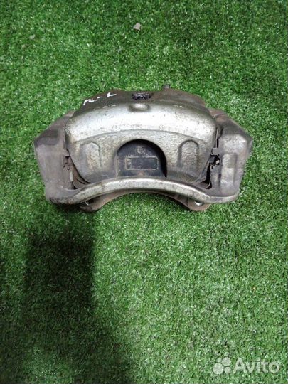 Суппорт тормозной передний левый Kia Optima JF