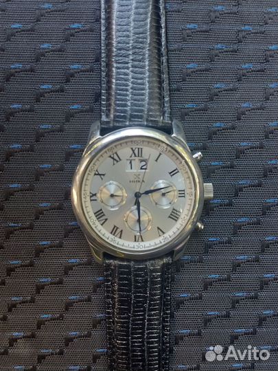 Серебряные часы ника