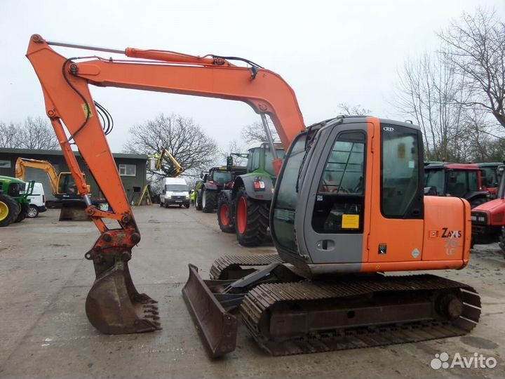 Стекло лобовое нижнее экскаватор гусеничный Hitach