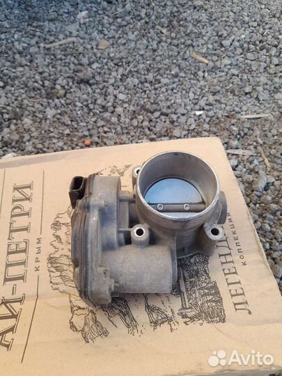 Дроссельная заслонка