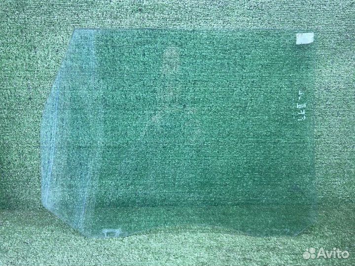 Стекло двери заднее левое Ford Focus 2