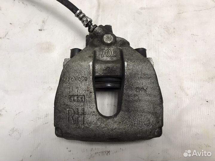 Суппорт передний правый Mazda 3 BL 1.6