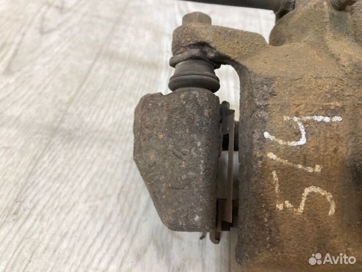 Суппорт передний правый Mitsubishi Lancer 9 CS3A