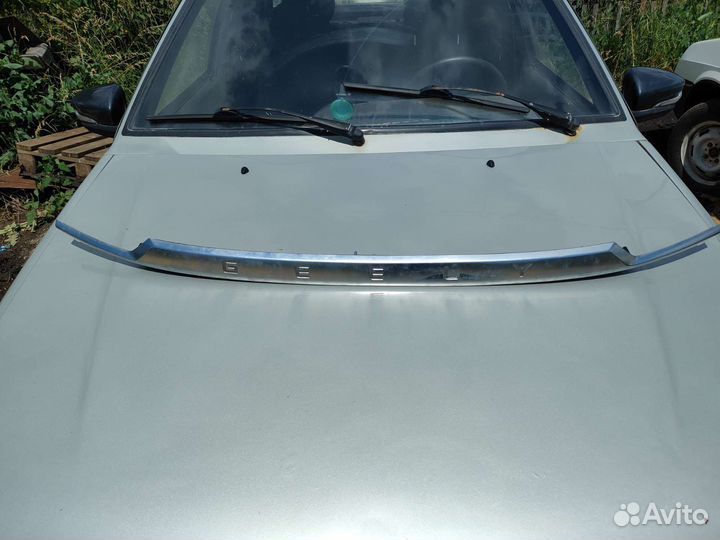 Накладка на заднюю крышку багажника Geely coolray