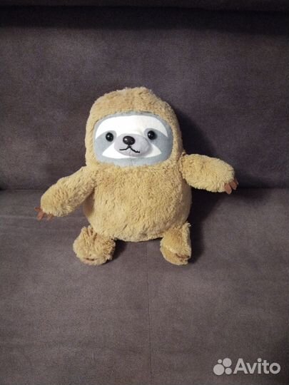 Плюшевый енот