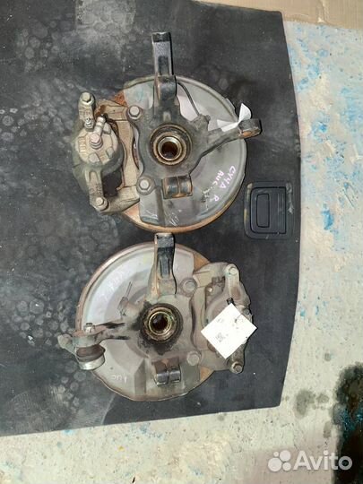 Поворотный кулак Mitsubishi lancer 10 в сборе