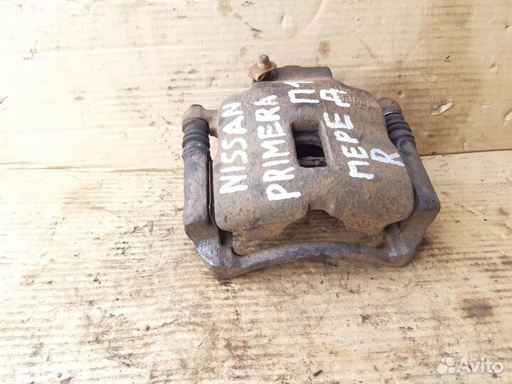 Суппорт передний Ниссан Примера П10