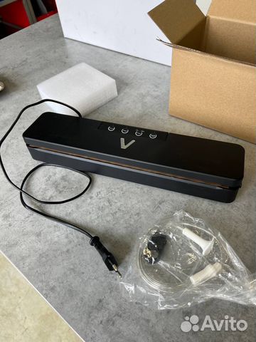 Вакуумный упаковщик