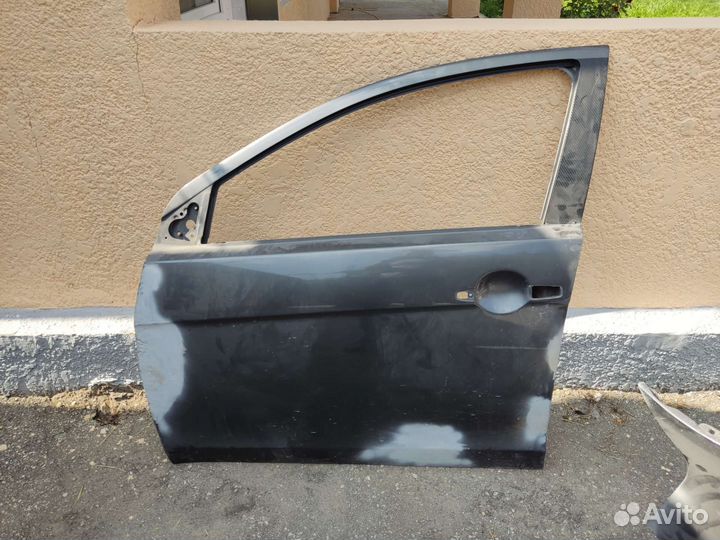 Дверь передняя левая митсубиси лансер х
