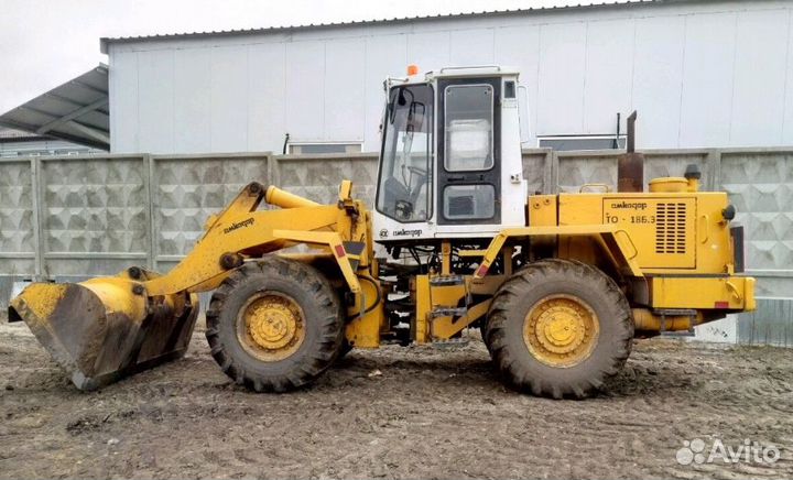 Фронтальный погрузчик амкодор