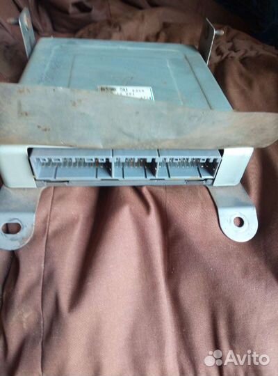 Блок управления Мазда 323