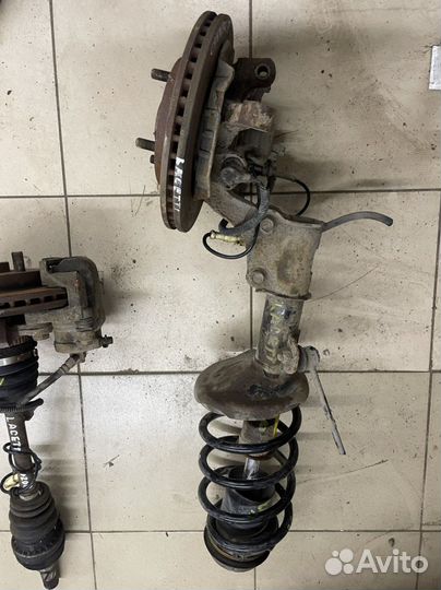 Шевролет лачети 04-13 Разбор Суппорт скоба