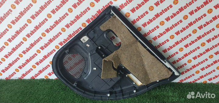 Обшивка боковой двери задняя левая Nissan Tiida