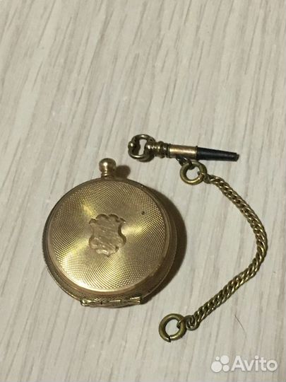 Золотые карманные часы