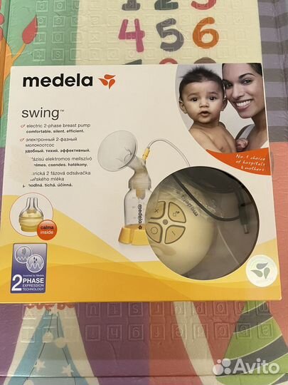 Молокоотсос medela swing и набор кормящей мамы