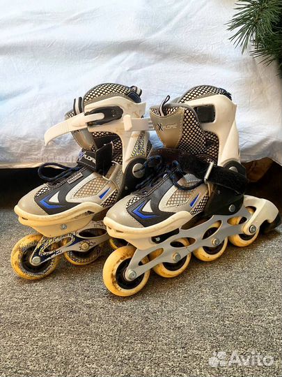 Роликовые коньки