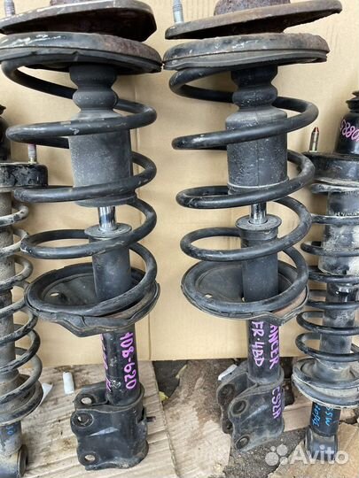 Стойки комплект оригинал митсубиси Лансер 9