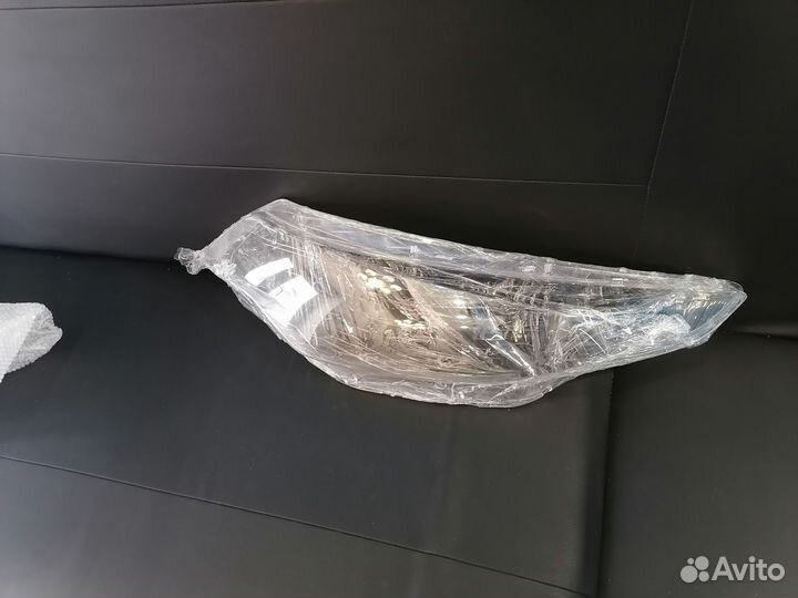 Стекло фары optima