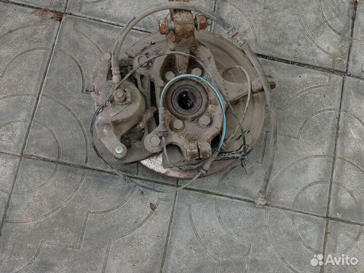 Ступица в сборе с суппортом Nissan Juke F15