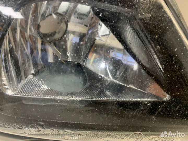 Фара противотуманная левая Volkswagen Tiguan 2011