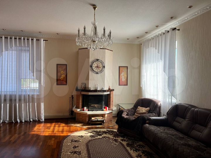 Коттедж 253 м² на участке 12 сот.