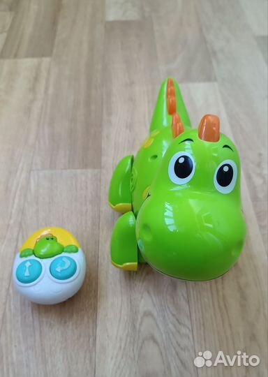 Игрушка музыкальная динозаврик с пультом baby go