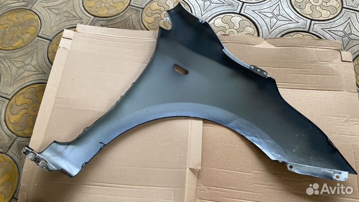 Левое крыло заводское на киа рио