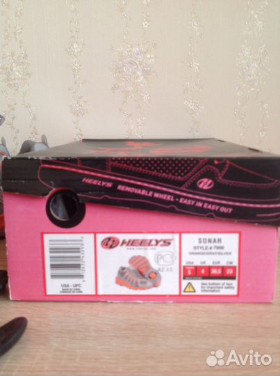 Кроссовки на роликах Heelys