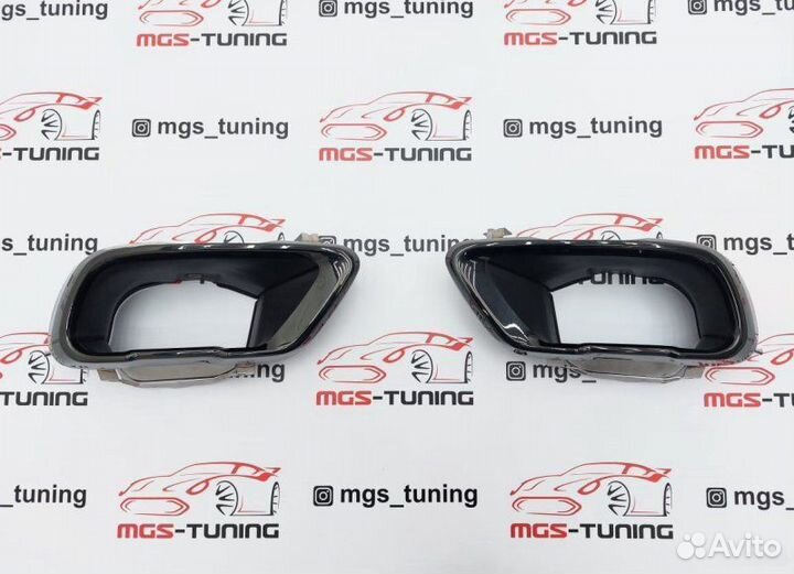 Черные насадки на выхлоп на BMW X6 G06