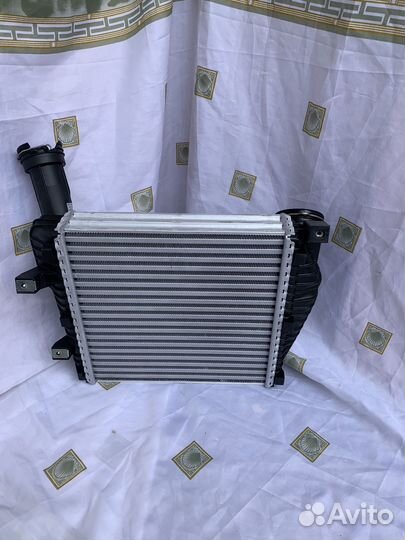 Интереклер правый VAG 7P0145804B