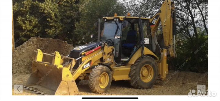 Эксковатор-погрузчик