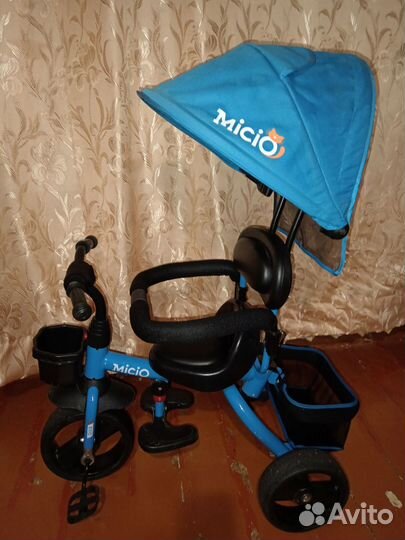 Трехколесный велосипед с ручкой