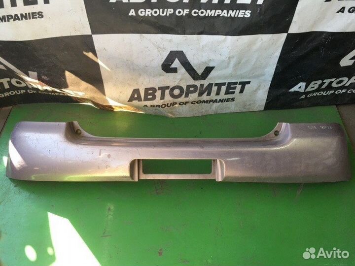 Бампер задний Toyota Vitz SCP10