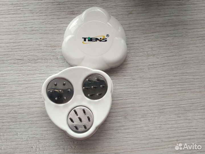 Массажёр - расчёска Тяньши