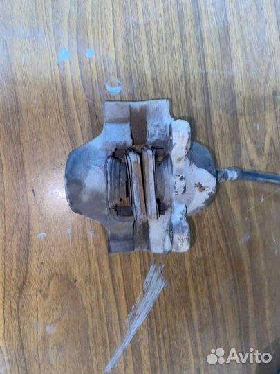 Суппорт тормозной задний левый Mercedes-Benz