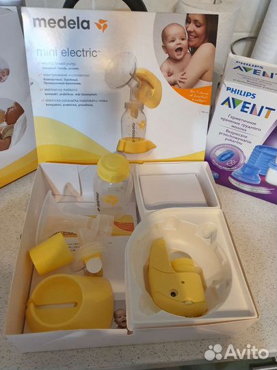 Молокоотсос medela электрический + контейнеры