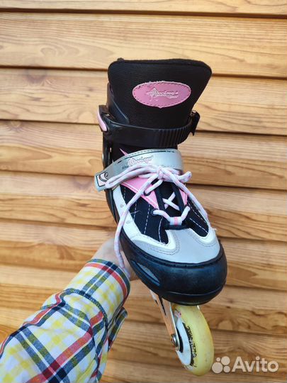 Роликовые коньки