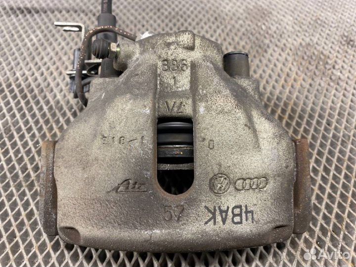 Суппорт передний левый Volkswagen Passat Variant