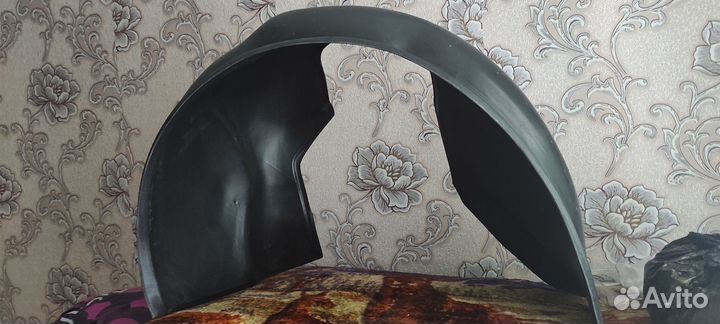 Подкрылок передний левый renault logan