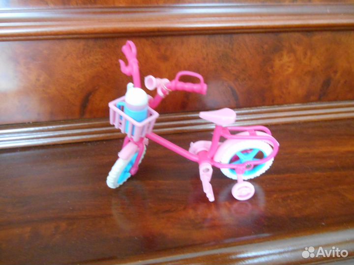 Кукла с велосипедом