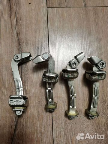 Ограничитель задней двери