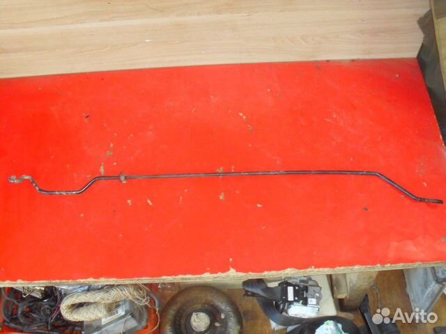 Держатель капота 65771AV600 Nissan Primera (P12)