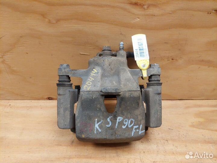 Суппорт передний левый Toyota Vitz KSP90 1krfe