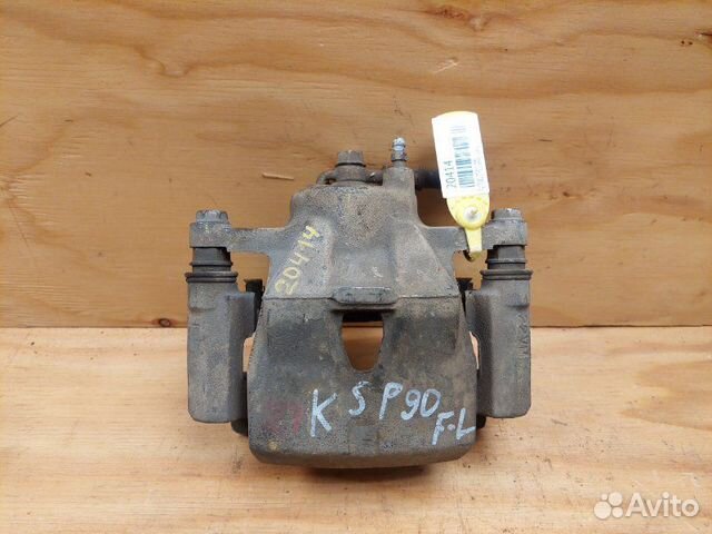 Суппорт передний левый Toyota Vitz KSP90 1krfe