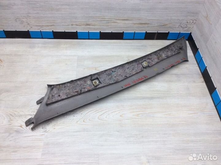 Обшивка стойки передняя правая Mitsubishi L200 KB