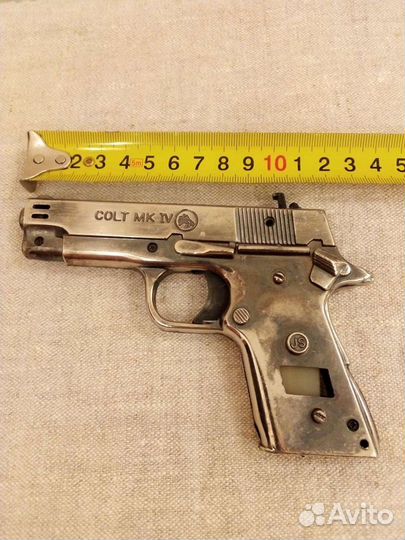 Зажигалка пистолет colt