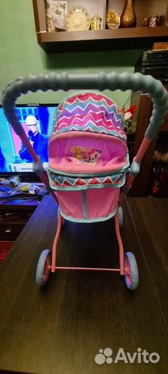 Детская игрушка коляска